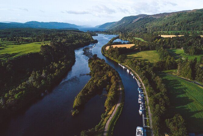 Caledonian Canal and Loch Ness Sightseeing Cruise - The cruise on Caledonian Canal: Aldourie Castle and Bona Lighthouse from the water